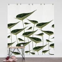 Large botanical leaves wall mural in modern bedroom interior