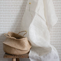 small paintbrush dots in neutral color wallpaper design