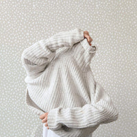 small animal print neutral peel and stick wallpaper
