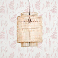 Light pink fern design removable wallpaper in modern bohemian nursery interior