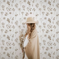 country house inspired floral wallpaper design in beige