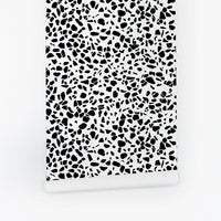 black and white terrazzo inspired peel and stick wallpaper