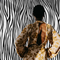 monochrome animal print wallpaper in walk in closet