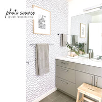 Minimal farmhouse design kids bathroom interior with grey spots wallpaper accent wall