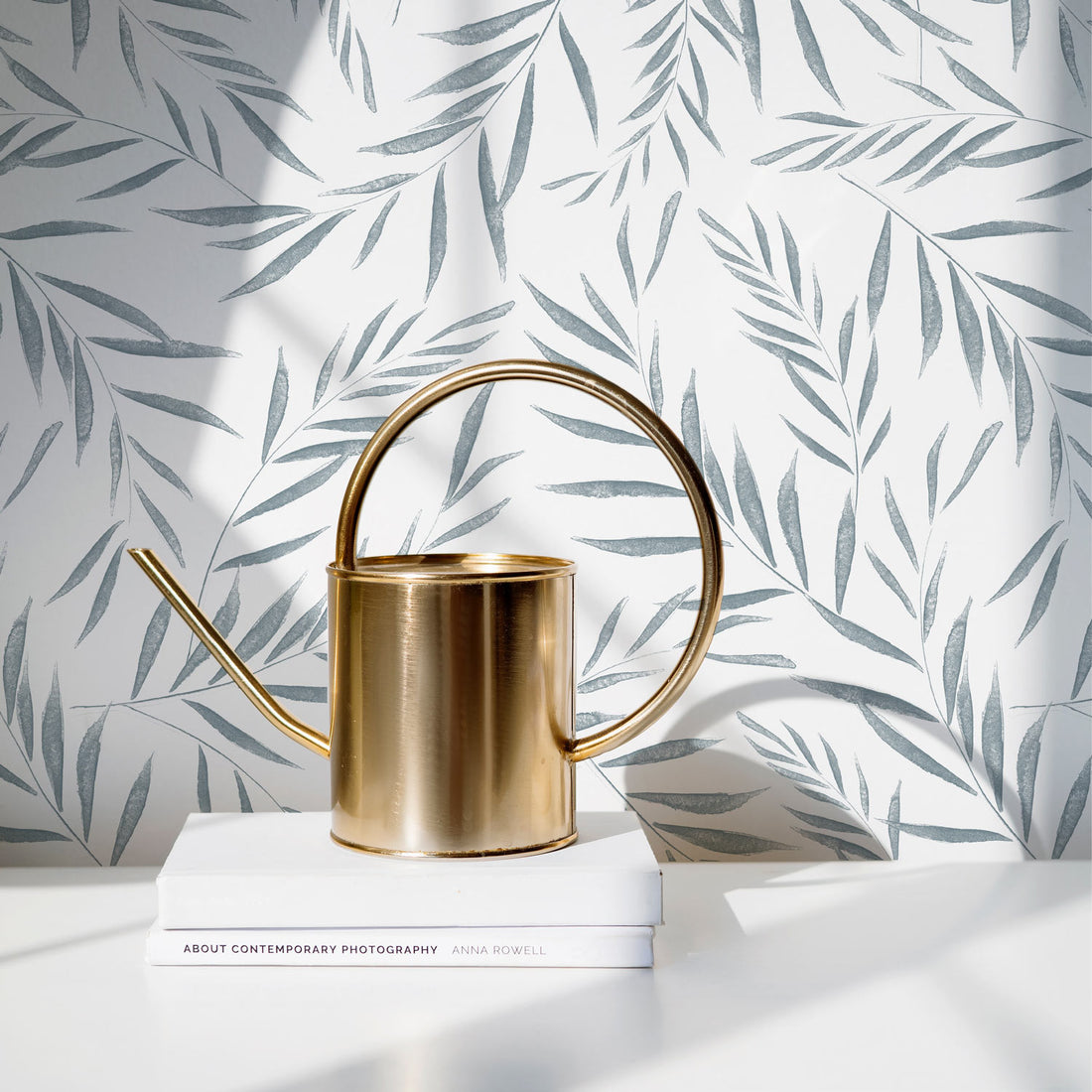 botanical fern leaf wallpaper in dining room