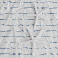 light blue coastal fabric with tiny dots