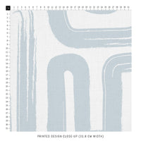 light blue printed fabric close up