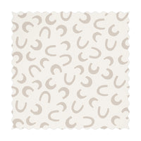 beige color fabric with tiny horseshoe prints