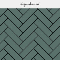 green herringbone tile backsplash