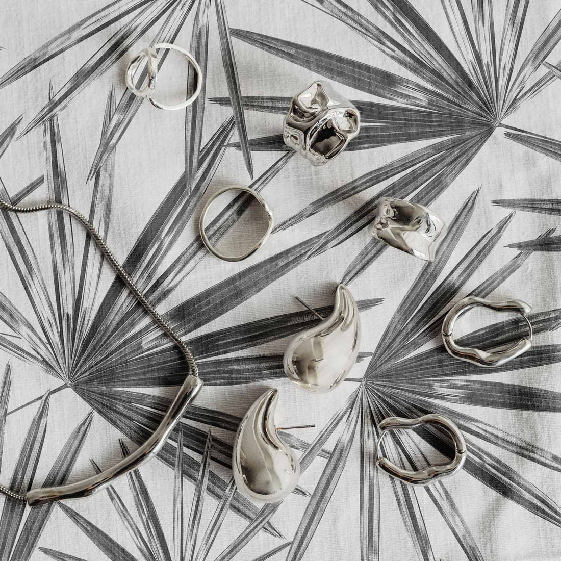 classy fabric design with black and white palm leaves
