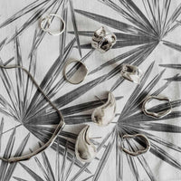 classy fabric design with black and white palm leaves