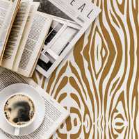 tiger print wallpaper in bright faux gold color