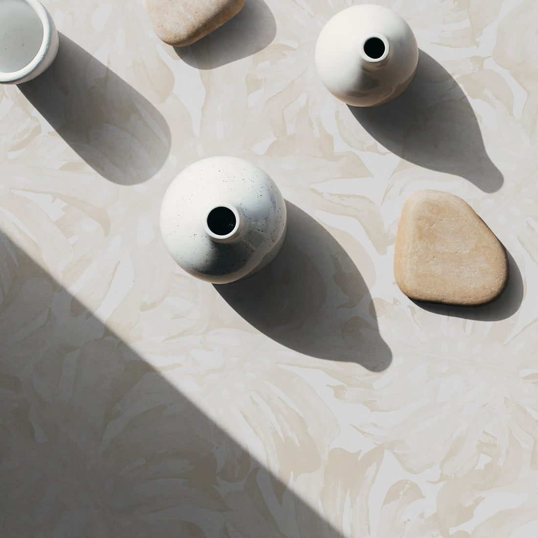 soft neutral oversized palms wallpaper pattern