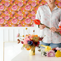 All white interior with board and batten and colorful floral removable wallpaper