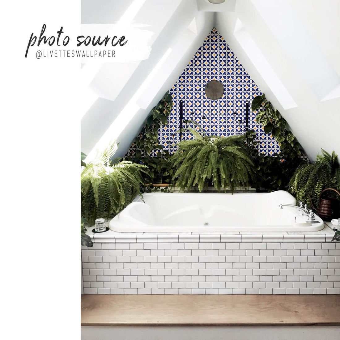 blue and yellow portuguese tiles inspired wallpaper behind bath