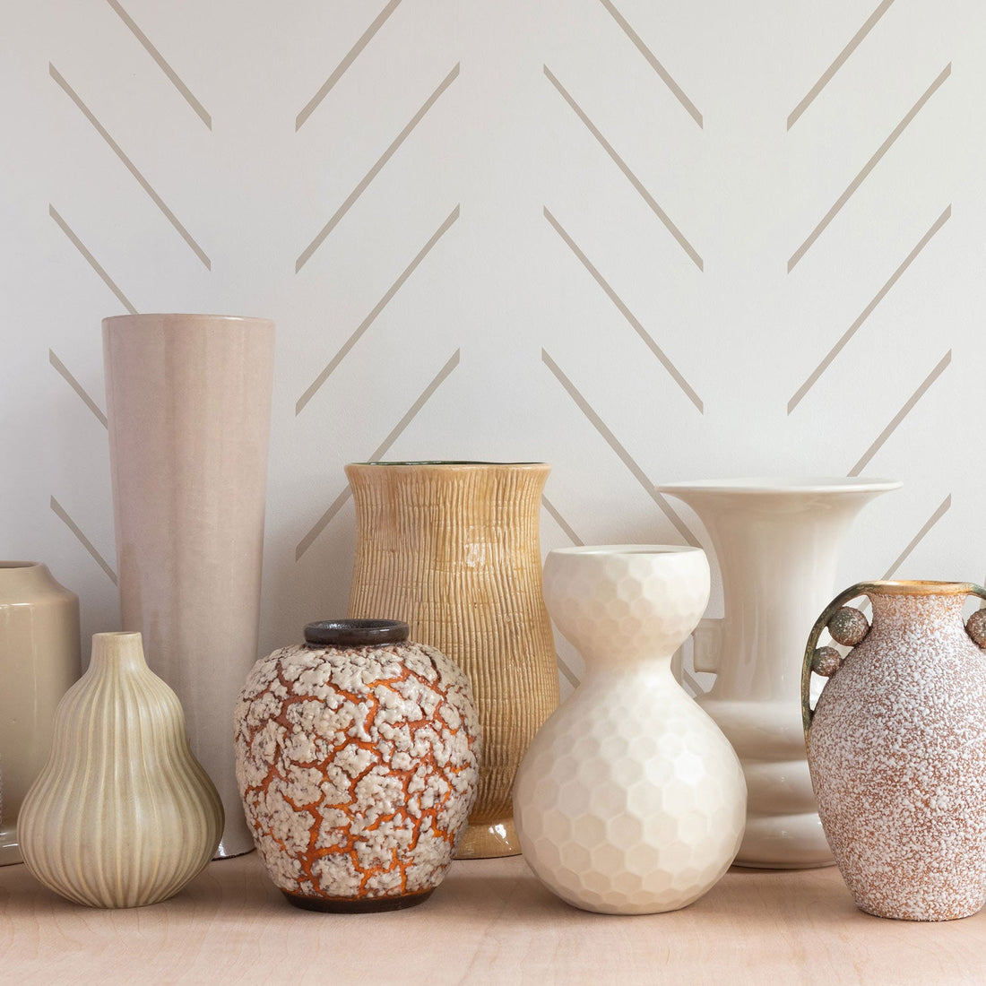 beige simple stripe wallpaper together with beautiful vases