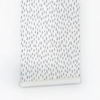 Designer wallpaper with grey speckle accents