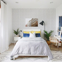 white bedroom interior for boys with abstract chevron pattern wallpaper