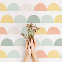 geometric half circles print wallpaper in rainbow colors