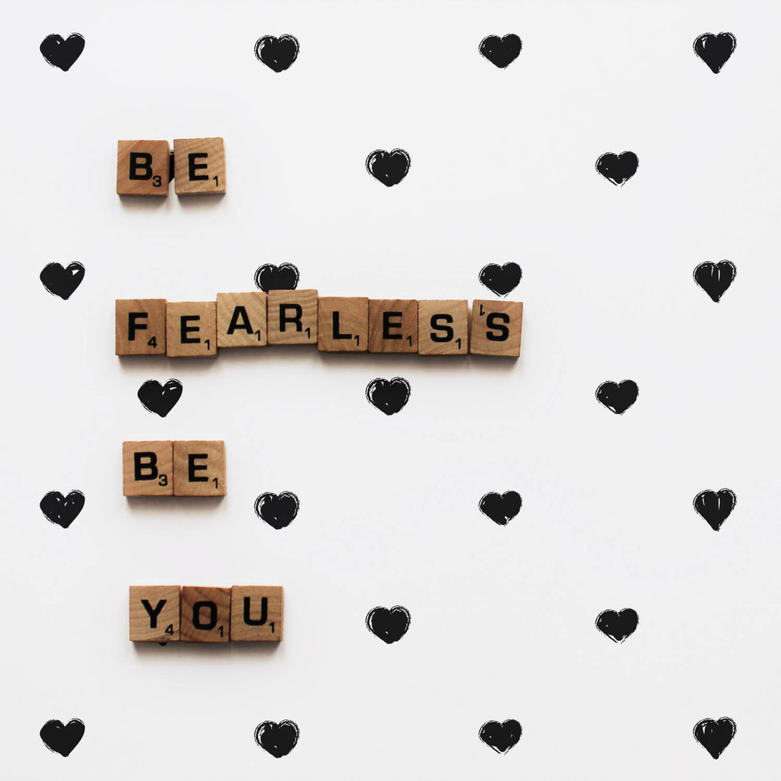 tiny little black and white hearts wallpaper for nursery interior