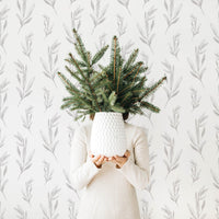 white farmhouse living room christmas decor interior with botanical removable wallpaper