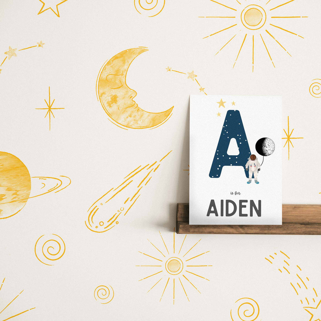 yellow space inspired wallpaper for little boys bedroom interior